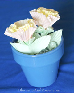 Super cute flowers made from cupcake papers! You can use these as Valentines too - just open the leaves and write your message!